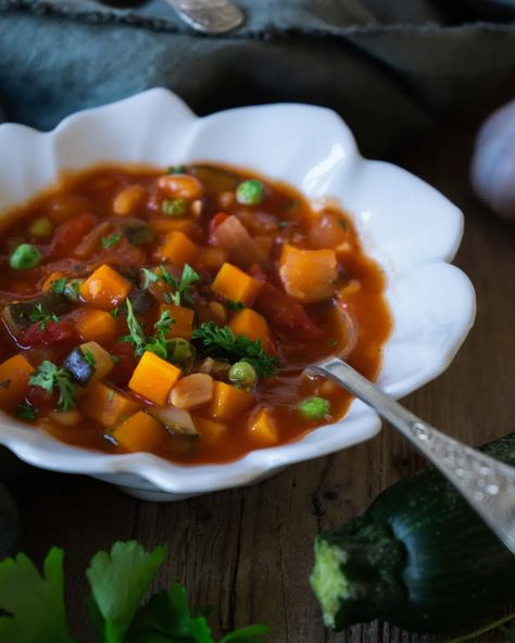 Farmhouse Vegetable Soup Hearty Soup, Tomato Vegetable, Summer Squash, Chopped Tomatoes, Hearty Soups, Crusty Bread, Vegetable Stock, Frozen Peas, Baked Beans