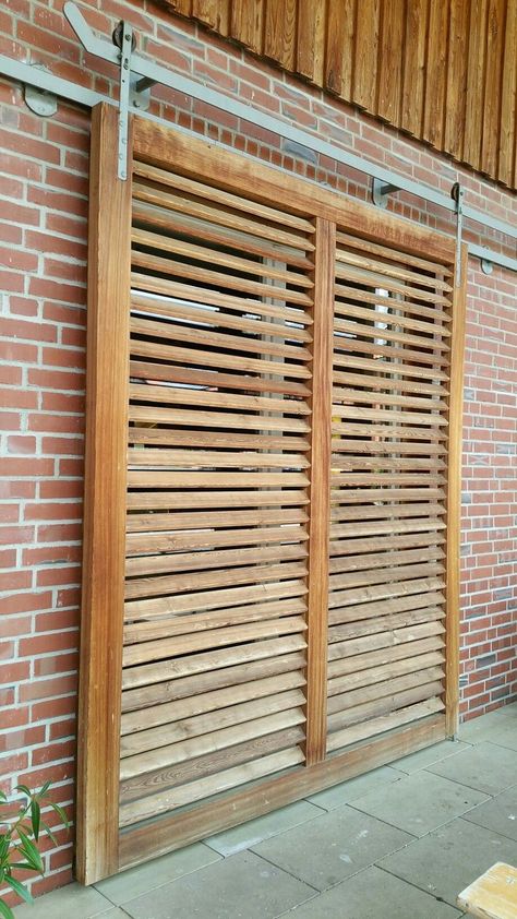 Single track option, not sure we have the headroom to do this | Shutters exterior, Sliding shutters, House exterior Outdoor Shutters, Sliding Shutters, Shutters Exterior, Back Patio, Garage Door, Modern House Exterior, Outdoor Projects, Container House, Exterior Colors