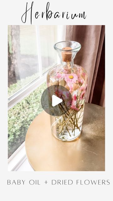 Janine Graff on Instagram: "Herbarium Jars🌸 Preserve cherished memories and capture the essence of special moments using any jar with a cork or lid,  dried, pressed flowers + plants and baby oil!

I recently learned about Japanese Herbariums and the art of preserving dried flowers in oil for display. 

I chose to make a larger herbarium, but you can create all different sized displays using any type of jar or container that you can seal with cork or a lid. 

Directions-
- Cut dried flowers to your desired length before inserting into your jar or bottle. Use dried flowers from your own yard or make a keepsake with dried flowers from weddings, funerals or special occasions.
- Allow for some flowers and stems to vary in length, color and texture for a visually pleasing display.
- Carefully a Dried Flowers In Oil, Preserving Dried Flowers, Janine Graff, Diy Floral Decor, Dried Pressed Flowers, Visually Pleasing, Baby Oil, Flowers Plants, Jar Lids