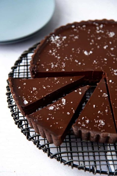 A simple chocolate tart is a fancy, decadent dessert! This creamy chocolate ganache tart is easy to make, and I’ve provided shortcuts to make the recipe even easier! #chocolate #dessert Chocolate Tarts Recipe, Chocolate Ganache Tart, Chocolate Ganache Filling, Chocolate Torte, Tart Dessert, Salted Chocolate, Fancy Desserts, Chocolate Tart, Creamy Chocolate