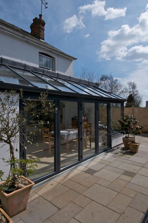 https://flic.kr/p/czQ7iA | Lean-to  Extension | Because all Apropos lean to conservatories are individually designed to meet your requirements, we can accommodate any unusual features within your home. For example, a lean to conservatory is ideal for homes with low ceilings, when the view from a first floor window may be obscured by a high, pitched roof, or single storey buildings with limited room under the eaves. Lean to conservatories are also a very practical solution when space is at a ... Lean To Extension, Lean To Conservatory, Curved Pergola, Garden Room Extensions, Lean To, Room Extensions, Glass Extension, Sunroom Designs, Enclosed Patio