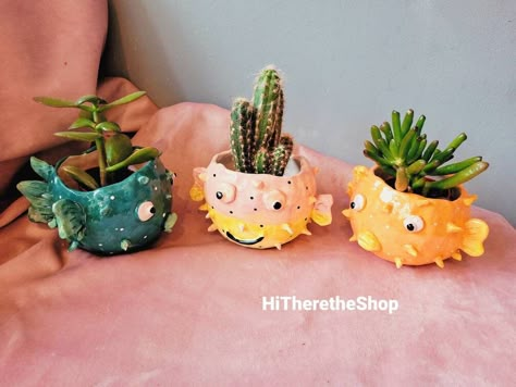 Hi there🙃 Let's connect! Features of this product: The happiest and cutest pufferfish on earth:) → handmade ceramic plant pots -- hand drawn design and of white background, → unique gift ideas, amazing for own use or work display, → home studio pottery, stoneware pottery, non-toxic and leadfree materials, → great value for the set of three 😚 → other styles available, please visit shop for them! Enjoy. Thanks for looking! Message me if any questions or ideas 😉 Hope all is well, Xin Planter Pottery, Outdoor Vases, Pottery Stoneware, Ceramic Succulent, Cactus Pot, Handmade Ceramics Vase, Pottery Gifts, Outdoor Planter, Pot Plant