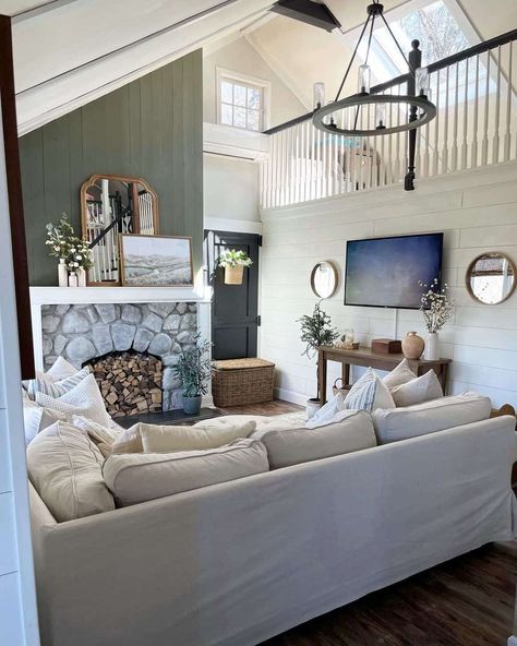 Large Shiplap Wall Living Room, Farmhouse Vaulted Ceiling Living Room, Wheel Light Fixture, Coconut Girl Room, Living Room With Vaulted Ceiling, Coconut Room, Wagon Wheel Light, Room With Vaulted Ceiling, Vaulted Ceiling Ideas