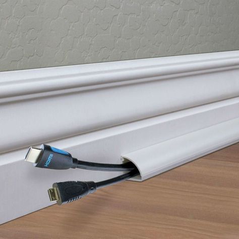 8 Tips for How to Hide TV Wires and Other Cords - Bob Vila Hide Tv Cable, Film Decor, Easy Home Improvement, Hidden Tv, Bob Vila, Narrow Hallway, Diy Interior, Decoration Inspiration, Cable Tv