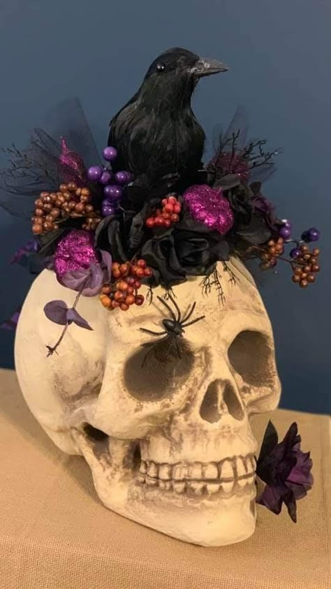 Foam Skull Ideas, Skeleton Floral Arrangements, Painted Skulls Halloween, Skull Centerpiece Halloween, Styrofoam Skull Crafts, Floral Halloween Decor, Plastic Skull Crafts, Pretty Halloween Decor, Skull Decorating Ideas