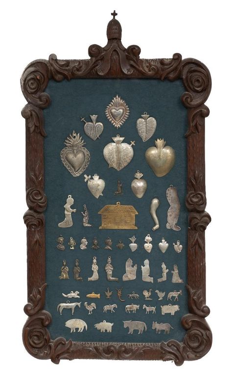 Lot of fifty framed and mounted Mexican folk art ex-votos charms, to include hearts, portraits, animals, etc frame: 24 x 13" #vogtauction #sanantonio #satx #mexicanart #folkart #mexicanfolkart #exvotos #heartart #mountedart #handcrafted #heartcharms #silver #mexicanjewelry #westernjewelry Mexican Tin Art, Folk Aesthetic, Milagros Charms, Female Experience, French Colonial, Desert Homes, Tin Art, Western Jewelry, Mexican Art