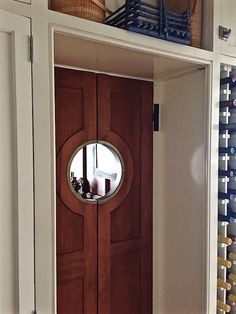 Nantucket House Tour bar door..porthole door to pantry. Swinging Doors Kitchen, Porthole Door, Nantucket House, Restaurant Door, Saloon Doors, Charming Dining Room, Bar Door, Nantucket Home, California House