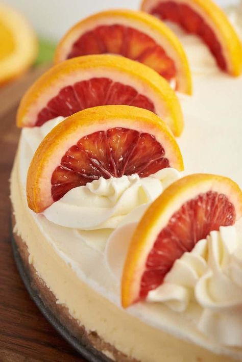 A wonderfully creamy blood orange cheesecake infused with tangy blood orange. This cheesecake is crowned with a stunning ring of sliced blood orange and has a vanilla wafer crust. Blood Orange Cheesecake, Orange Cheesecake Recipes, Aries Queen, Blood Orange Recipes, Orange Cheesecake, Vanilla Wafer Crust, Vanilla Wafer, Wafer Cookies, Vanilla Wafers