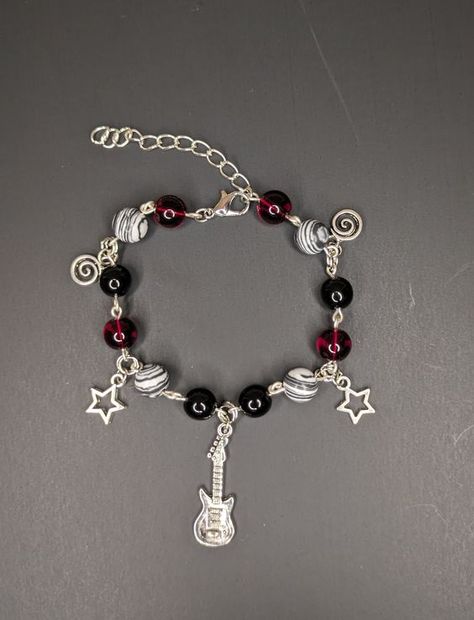 #bracelets #bead #beadedbracelets #DIY #handmade #jewelry #gemstones Black Star Bracelet, Cute Black Clothes Outfits, Cheap Black Necklaces With Star Charm, Red Black White Bracelet, Rockstar Gf Bracelet, 2000s Bracelets Aesthetic, Silver Black Jewelry, Jewelry Inspo Bracelets, Grunge Jewelry Bracelets