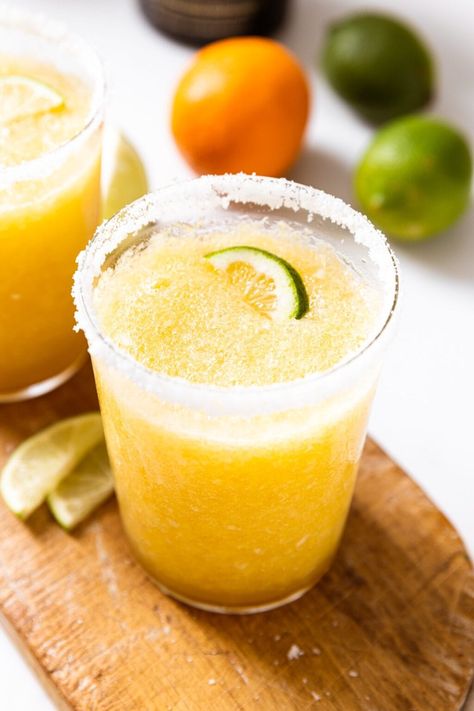 Let's make margaritas less complicated! What's great about this recipe is that you can throw the entire fruit (minus the peel) into the blender and mix it up! It's a citrus punch with a twist that is so nice during the spring and summer seasons! | wyseguide.com #citrus #margarita #drink #orange #lime Blended Margarita Recipe, Blended Margarita, Fruit Margarita, Citrus Punch, Wyse Guide, Slow Cooker Apple Butter, Fun Summer Drinks, How To Make Margaritas, Frozen Margaritas