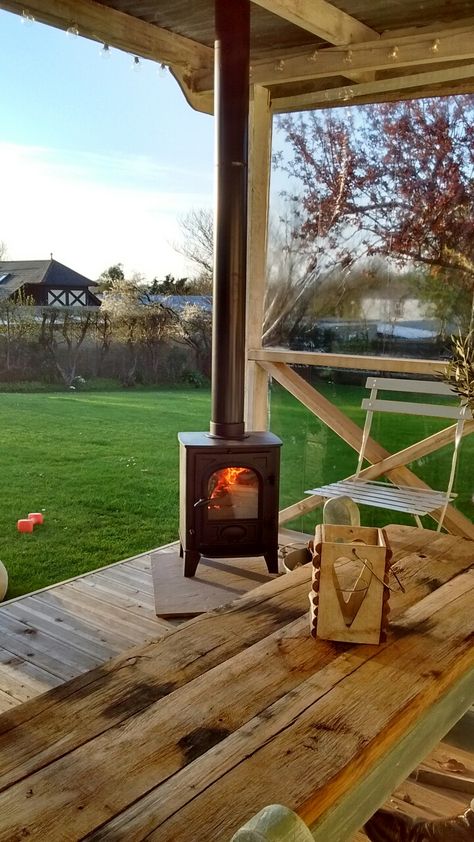 Outside,garden log burner , garden room , pavilion Garden Lodge Ideas, Outdoor Log Burner, Wood Burner Ideas, Garden Wood Burner, Outdoor Wood Burner, Covered Veranda, Garden Lodge, Courtyard Landscaping, Outdoor Fireplace Designs