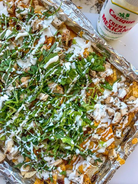 Chicken Bacon Ranch Nachos Chicken Bacon Ranch Nachos, Philly Cheesesteak Eggrolls, Cheesy Chicken Nachos, Cheesesteak Eggrolls, Sheet Pan Nachos, Pan Nachos, Ranch Recipe, Chicken Nachos, Egg Roll Recipes