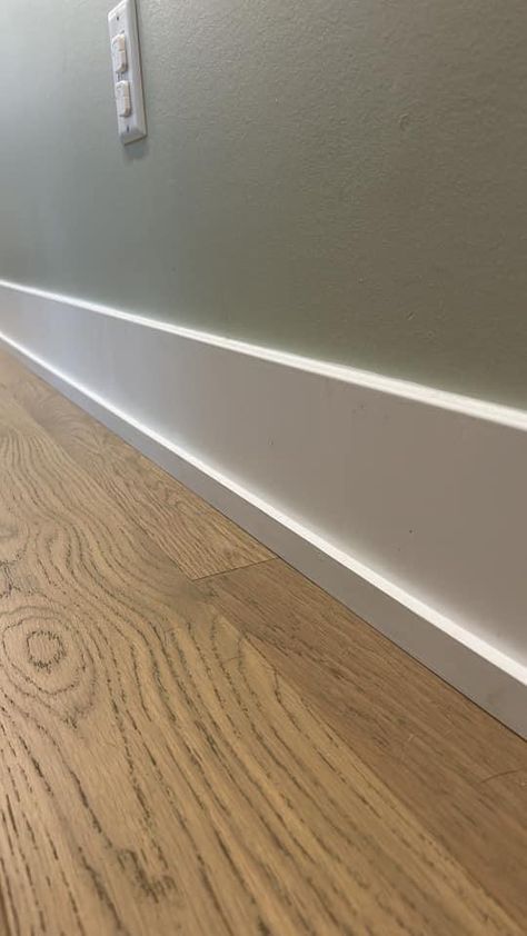 Large Trim Molding, Modern Home Baseboards, Modern Floor Molding, How To Heighten Ceilings, Modern Wood Baseboards, Modern Farmhouse Baseboards And Trim, Flooring Trim Baseboards, Modern Floor Trim, Flatstock Trim