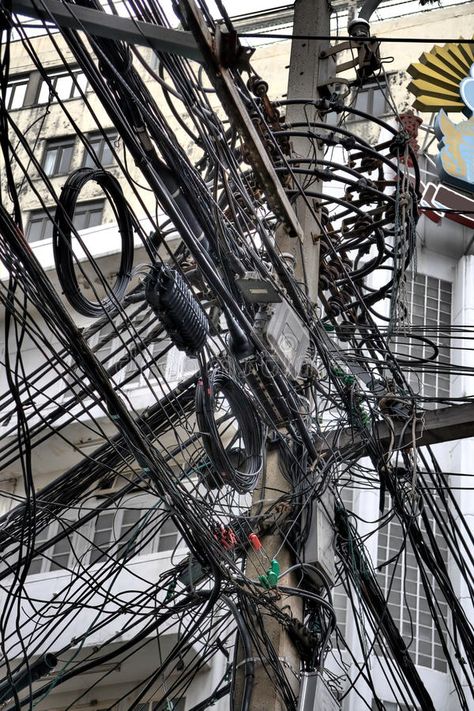 Wires on utility pole. A jumble of electrical and telephone wires attached to a #Sponsored , #Ad, #AFFILIATE, #utility, #jumble, #wires, #pole Robotics, Bangkok Thailand, Magazine Design, Utility Pole, Bangkok, Thailand, Stock Images, Electricity, Stock Photos