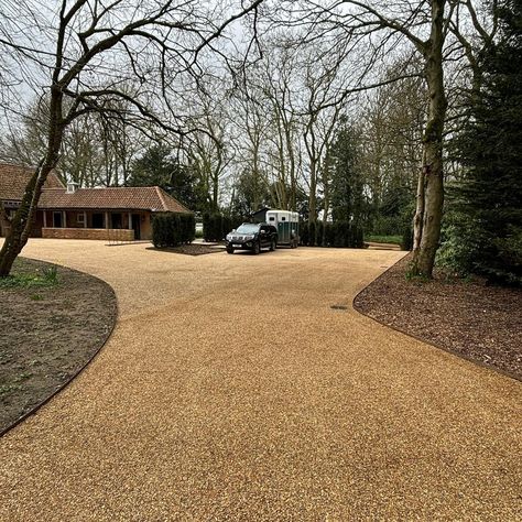 This driveway is giving us the autumnal aesthetic 🍂  Using our 10mm golden shingle to complete this new, clean look!  #Gravel #Stones #Norfolk #Norwich #Landscaping #GardenDesign #CustomerExperience #ProductSpotlight Gravel Driveway Landscaping, Gravel Driveway, Driveway Landscaping, House 2, Driveway, Norfolk, Garden Design, Stone