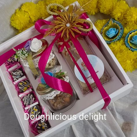 #Doughliciousdelight Diwali gifting option 1 Presenting to you our exclusive hamper this festive season.this is perfect gift for your love ones 💕💕💕 and for CORPORATE GIFTING This box contains 1 almond cashew nut pineapple rawa cake( healthier. version,no maida,made with milk,curd and rawa 6 pieces homemade assorted almond, cashew nut and,walnut chocolates 🍫 🍫 🍫 1. Jar of cashewnuts 1 Jar of almonds 2. Beautiful diyas ALL THE PRODUCTS IN THE HAMPER ARE EGGLESS ... Diwali Cake Hampers, Diwali Corporate Gift Ideas, Diwali Cake, Cake Hampers, Corporate Diwali Gifts, Milk Curd, Animal Theme Birthday, Corporate Gifting, Cashew Nut