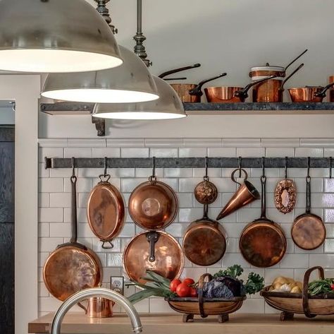 Brad Stanwick on Instagram: "A shot of our kitchen, showing my copper pot collection - as seen during the @homeworthy video!" Copper Pans Hanging In Kitchen, Copper Pot Display, Copper Pans Hanging, Copper Pots Display, Apartment Manifestation, Copper Pans, Copper Pots, Yellow Kitchen, Copper Kitchen