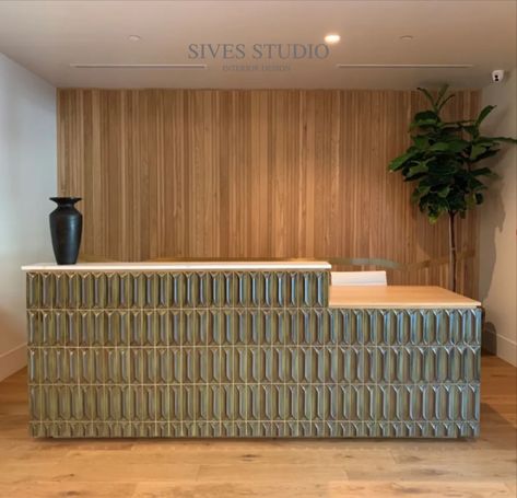 We put a lot of love into this!
A custom designed reception desk with stunning bronze patina tile inspired by vintage Gio Ponti tile. A custom wood paneled wall in laid with brass in backdrop. At our Fedora & Trilby interior project.
Designed by us! @siveotoole Lobby Reception Desk, Koreatown Los Angeles, Front Desk Design, Wood Reception Desk, Custom Reception Desk, Reception Desk Office, Los Angeles Interior Design, Reception Desk Design, Studio Interior Design