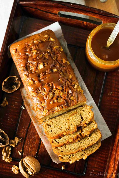 This delicious dense coffee flavoured walnut cake is a sinful dessert that you must try. The cake is then drizzled with the goodness of homemade caramel sauce and generously sprinkled with walnuts on the top. Serve the Tea cake with some Maple Roasted Cinnamon Spiced Latte by the side to enjoy your evening snack. Coffee Caramel Cake, Walnut Cake Recipe, Coffee Ice Cream Recipe, Walnuts Recipe, Coffee And Walnut Cake, Coffee Caramel, Tea Cakes Recipes, Eggless Cake Recipe, Eggless Desserts