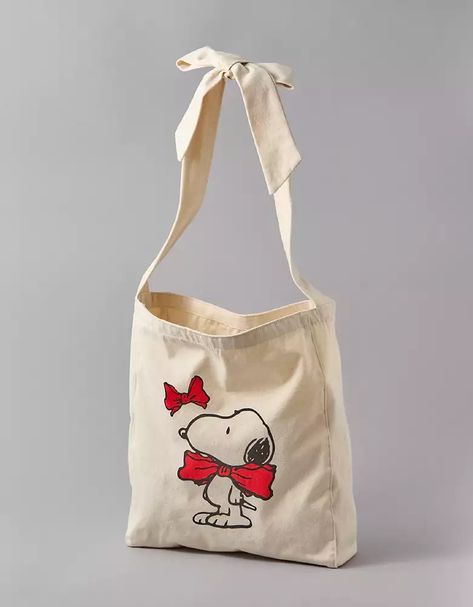 Women's Peanuts & Snoopy T-Shirts & Clothes | American Eagle Fall Pjs, Snoopy Holiday, Snoopy Shirt, Snoopy T Shirt, Holiday Bows, Peanuts Snoopy, Mens Outfitters, Belt Bag, Canvas Tote