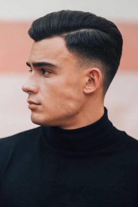 Elevate your style with the suave charm of the side part low taper fade haircut! This timeless look seamlessly blends sophistication with a touch of modern flair. With its clean lines and gradual fade, the side part low taper fade offers a polished yet versatile appearance suitable for any occasion. Whether you're heading to the office or a special event, this haircut exudes confidence and refinement. Discover how the side part low taper fade can elevate your grooming game Low Taper Fade Slick Back, Low Taper Side Part, High Top Haircut, Low Taper Fade Haircut, Low Taper Fade, Low Taper, Haircut For Men, Classic Taper, Fade Cut