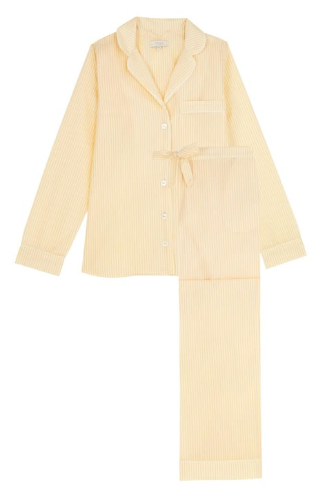 Description Crafted from the finest cotton seersucker in a soft shade of yellow, woven in Italy, these pyjamas are a harmonious blend of quality, eco-friendliness, and elegance. Featuring a classic revere collar, a delicate ivory piping and pearl buttons these pyjamas are designed with your comfort in mind. The relaxed fit and adjustable drawstring waist ensure that you feel cozy while still having the freedom to move and relax with ease. MADE IN EUROPE WITH ORGANIC COTTON. Details & Care • 100% Yellow Wishlist, Pyjamas Aesthetic, Cute Pjs, Cute Pajama Sets, Revere Collar, Cute Pajamas, Cotton Pyjamas, Pyjama Set, Pearl Buttons