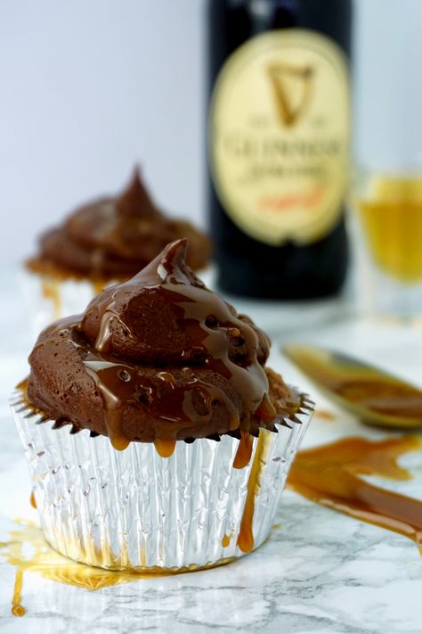 Jameson Irish Whiskey salted caramel cupcakes topped with decadent Guinness chocolate espresso buttercream and drizzled with whiskey salted caramel. Leprechaun-approved, these boozy cupcakes will be a hit at your St. Patty’s day festivities.  #cupcakes #stpattys #boozyrecipes #chocolate #jameson #whiskey #guinness #caramel #irishdessert Irish Whiskey Cake, Whiskey Cupcakes, Whiskey Caramel, Espresso Buttercream, Guinness Cupcakes, Guinness Chocolate, Boozy Cupcakes, Salted Caramel Cupcakes, Cupcakes With Chocolate