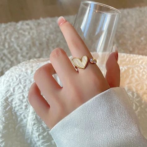 📍Round Ring Women's Fashion Luxury🤍 👉🏻To order through 📌the website:https://www.jewelglamour.com/collections/rings/products/2022-korean-new-exquisite-geometric-round-ring-womens-fashion-luxury-zircon-finger-ring-simple-temperament-versatile-jewelry 📌 For more info WhatsApp: +44 7460 779657 📌Facebook: https://www.facebook.com/profile.php?id=61556939033801 📌 Instagram : https://www.instagram.com/official.jewelglamour/ #jewelglamour #jewelry #jewellery #jewelrylover #jewellerylover #pand... Korean Jewellery, Rings Trendy, Finger Heart, Shell Ring, Trendy Ring, Unusual Jewelry, Simple Bracelets, Finger Rings, Ring Unique