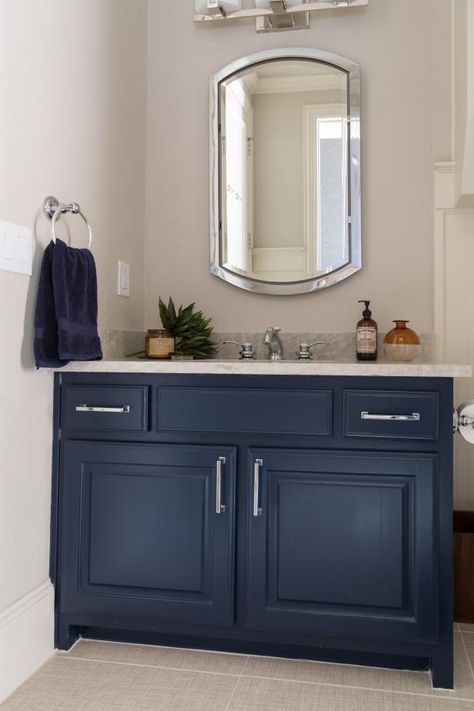 HGTV.com loves this striking navy blue bathroom vanity. Beige And Blue Bathroom, Double Sink Bathroom Ideas, Beige Wall Colors, Before And After Home, Navy Blue Bathrooms, Navy Bathroom, Blue Bathroom Vanity, Marble Tile Bathroom, Blue Vanity