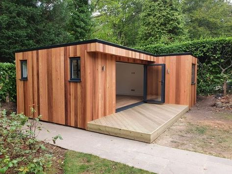 This is a truly multi-functional space thanks to the L-shaped floor plan. This studio includes a 7m x 3.5m workout area that meets a 2m x 2m office. Finished with vertical cedar cladding and aluminium bi-fold doors, this is a contemporary design that maximises space. Conservatory Extension, Garden Cabins, Cedar Cladding, Cedar Garden, Room Gym, Gym Office, Gym Home, Back Garden Design, Backyard Office