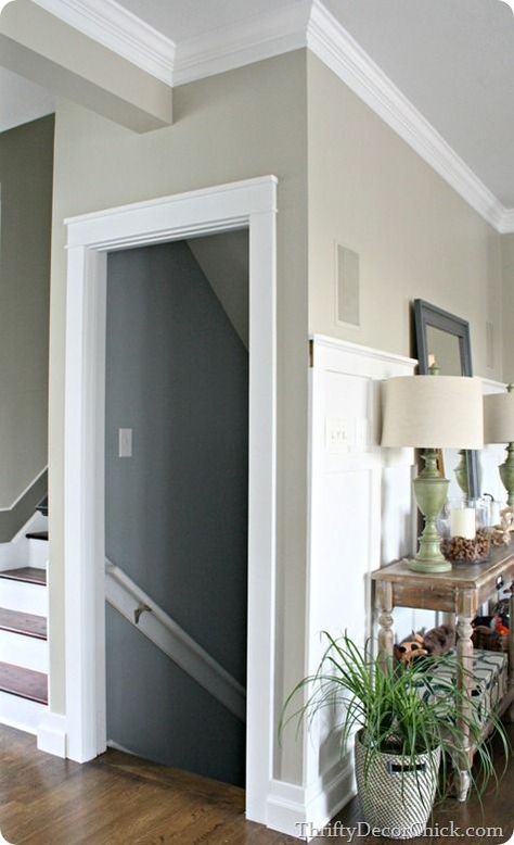 Learn how to add a thick craftsman door trim to your doorways! | DIY Staircase Walls Makeover, Basement Handrail, Doorway Casing, Analytical Gray, Craftsman Door Trim, Trim Wainscoting, Basement Entry, Craftsman Style Trim, Basement Door