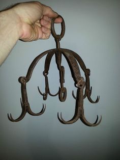 Meat hooks. Meat Hook, Industrial Chic, Candle Sconces, Online Marketplace, Wall Lights, Top Brands, Ceiling Lights, Collectibles, House Design