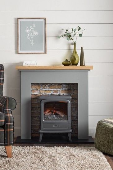 Brick Effect Space Saving Fire Surround Electric Log Fireplace Ideas, Electric Log Burner Living Room, Electric Wood Stove Ideas, Fire Surround Ideas, Painted Fire Surround, Wood Stove Decor, Electric Wood Stove, Electric Stove Fireplace, Wooden Fire Surrounds