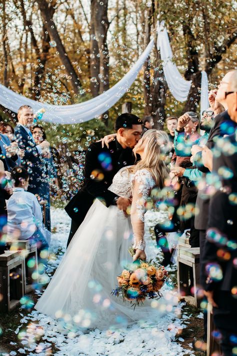 Bubbles at wedding | wedding pose Bubble Wedding Exit Photography, Bubbles At Ceremony Weddings, Bubbles As Confetti, Bubble Wedding Ceremony, Wedding Bubbles Send Off Photography, Wedding Ceremony Bubble Exit, Wedding Photo Bubbles, Blowing Bubbles At Wedding, Wedding Send Off Pictures