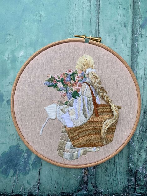 "7\" embroidery on pink cotton. Hand embroidered girl in white dress, hiding behind a boutique of wildflowers, woven beach bag and quirky embroidered hair that is loose from the hoop, styled into a braid and stitched in place." Embroidery Hoops Ideas, Embroider Hair, 3d Braid, Braided Embroidery, Acid Wallpaper, Braid Embroidery, Hair Embroidery, Girl In White Dress, Woven Beach Bag