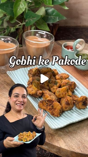 Cook With Rupam Sehtya on Instagram: "Golden, crispy, and irresistibly delicious – Gobhi ke Pakode are the ultimate comfort food for chilly evenings or rainy days. Each bite is a perfect blend of crunchy batter and tender cauliflower, packed with bold flavors and just the right amount of spice. Pair them with mint chutney or a steaming cup of chai, and you have a snack that's pure joy on a plate. Who else loves this desi classic? #instafood #winterfoodies
#reelsinstagram #pakora #winter #pakode #winterrecipes
#trending #reelsinstagram #pakoda #gobhipakora #reelsindia #FoodieMagic #trending #trendingfoodreels
#foodiesofinstagram #cauliflower #cauliflowerrecipes
#gobhi #gobhipakora

Ingredients:-
Cauliflower 
1/2 tsp Salt
1 tsp Cumin Seeds 
1/2 tsp Fennel Seeds
1 tsp Coriander Seeds 
Ginger Gobhi Pakoda, Evening Snacks Indian, Mint Chutney, Cumin Seeds, Steaming Cup, Evening Snacks, Indian Snacks, Ultimate Comfort Food, Coriander Seeds