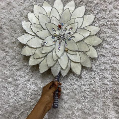 Check out our beautiful piece of Elegant Traditional African Wedding Bridal Handfan suitable for all or occasion Send us a DM to get your own piece today. Happy Monday people. #BerryAfricana #fashionnova #FashionForward #nigeria #bridalfan #bridaljewellery Bridal Hand Fan, Bridal Fans, Traditional African Wedding, Wedding Hand Fan, Hand Fans For Wedding, Wedding Hands, Wedding Fans, Nigerian Wedding, African Wedding