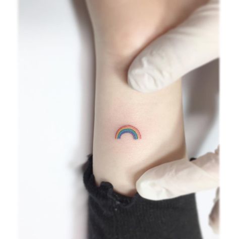 Playground Tattoo on Instagram: “. . Rainbow🌈 . . #rainbowtattoo” Jewerly Tattoo, Rainbow Tattoo, Cute Ankle Tattoos, Rainbow Tattoos, Shape Tattoo, Home Tattoo, Nature Tattoos, Ankle Tattoo, Little Tattoos