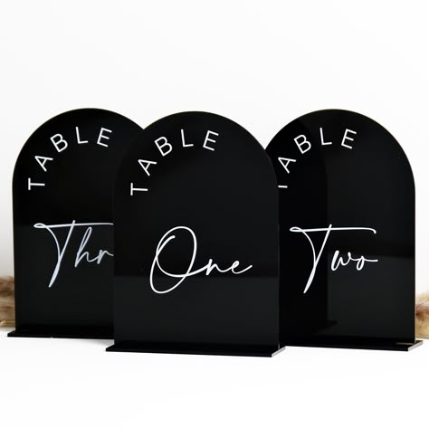 PRICES MAY VARY. PACKAGE INCLUDES: 5x7 inch black acrylic table numbers 1-20 with black acrylic stand, total 10 sets in one pack. Each black acrylic arch signs Has A Protective Film On Both Sides To Prevent Scratches and when you are ready to use it, you should peel it off. SIMPLE & ELEGENT DESIGN: These modern minimalistic arch wedding black table numbers are the perfect touch to add to your wedding. We love the sleek, clean lines of these arch acrylic signs, they are a beautiful wedding table Black Arch Wedding, Black Table Numbers, Black Wedding Table, Table Numbers For Wedding, Arch Sign, Wedding Reception Tables Centerpieces, Acrylic Arch, Black Centerpieces, Arch Table