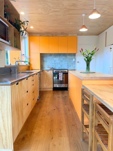 We're breaking all the rules with this kitchen design, and yet somehow it still functions great and looks fantastic! Timber on timber materials with bright orange features and cool blue accents. Plywood Kitchen, Orange Kitchen, Dream House Decor, Blue Accents, Solid Pine, Entertainment Unit, Kitchen Renovation, Bright Orange, The Rules