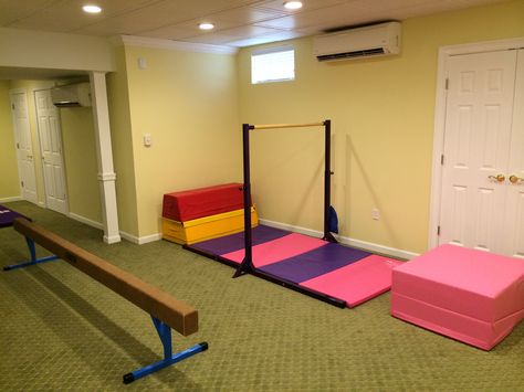 Inside Gymnastics Room, Gymnastics Basement Ideas, Gymnastic Room Ideas, Garage Gymnastics Gym, Basement Gymnastics Area, Gymnastics Room In House, Home Gymnastics Room For Kids, At Home Gymnastics Room, Home Gymnastics Room