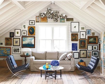 Williams-Sonoma Living Room | studio living room with pictures hung on a triangular wall. Elle Decor ... Martis Camp, Finished Attic, Eclectic Contemporary, Structural Drawing, Picture Gallery Wall, Chalet Interior, Slanted Ceiling, Attic Renovation, Attic Spaces