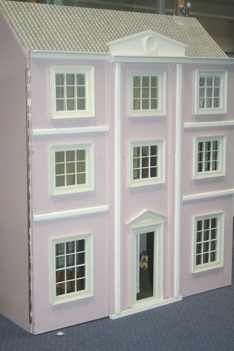 A modern Georgian style doll's house, the double opening front revealing six rooms and staircases, width approx 61cm, and a collection of doll's house furniture. #tooveys Georgian Dolls House Exterior, Georgian Dolls House, Maileg House, Modern Georgian, Georgian Townhouse, Casa Exterior, Georgian Homes, Miniature Doll, House Furniture