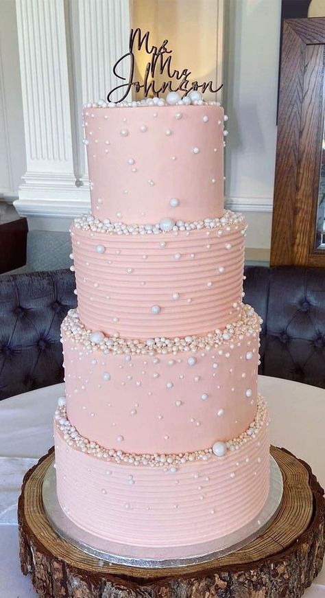 blush pink cake, pearl wedding cake, wedding cake, wedding cake ideas, pearl wedding cake, pearl embellishment cake, wedding cakes with pearls, cake with pearls, cake with pearls and flowers, edible pearls wedding cake, latest wedding cake gallery Cake With Pearls And Flowers, Wedding Cakes With Pearls, Pink Cake With Pearls, Wedding Cake Pearl, Two Tier Pearl Wedding Cake, Pearl Wedding Cakes, Peal Wedding Cakes, Wedding Cakes Pink, Pink Pearl Wedding Cake