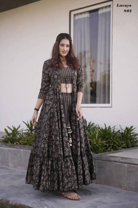 Stunning 3-piece Koti Style Indo-Western Suit of Printed Crop Top, Palazzo And Parallels paired With a Beautiful Printed Shrug Set Fabrics:- Heavy MUSLIN Silk With Digital Printed Work Crop Top Inner Attached Size :- XS-34, S-36, M-38, L-40, XL-42, XXL-44, 3XL-46, 4XL-48, 5XL-50 & 6XL-52 Length :- Shrug - Max Up to 55-57" Crop Top - Max Up to 15" Palazzo - Max Up to 38-40" Flair :- Shrug - Approx 3.00 to 4.40 Mtr. Fancy Crop Top, Western Suit, Western Dresses For Women, Trendy Outfits Indian, Printed Crop Top, Long Gown Design, Lehenga Designs Simple, Traditional Outfit, Trendy Dress Outfits