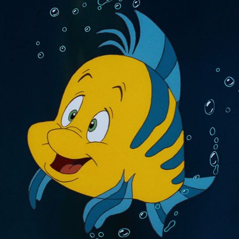 Flounder is a major character in Disney's 1989 animated film The Little Mermaid. He is Ariel's best friend, who regularly embarks on her adventures despite his cowardly demeanor. Though his name would imply otherwise, he is not a flounder, but a tropical fish. Flounder comes from a large family, with numerous siblings. His actual name, according to "The Evil Manta", is Guppy Number 35. His exact age is unknown, but he appears to be younger than Ariel (16) during the events of The Little... Disney Images, Ariel, Fish, Disney, Yellow, Blue, Color