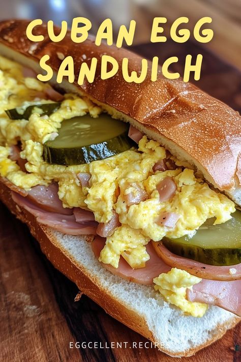 Featuring savory ham, creamy Swiss cheese, and fluffy scrambled eggs all packed into a crusty Cuban bread, it’s a delightful morning treat that will transport your taste buds to a Caribbean paradise. #Cuban Egg Sandwich #cuban sandwich egg rolls #Cuban Sandwich #Cuban Sandwich recipe #Cuban Sandwich sliders #cuban sandwich recipe authentic #cuban sandwich side dish #cuban sandwich sauce #cuban sandwich dip #cuban sandwich bread #cuban sandwich pork recipe Cuban Sandwich Sliders, Sandwich Sliders, Cuban Sandwich Recipe, Egg Recipes For Dinner, Savory Ham, Egg Lunch, Eggs Dinner, Cuban Bread, Sandwich Sides