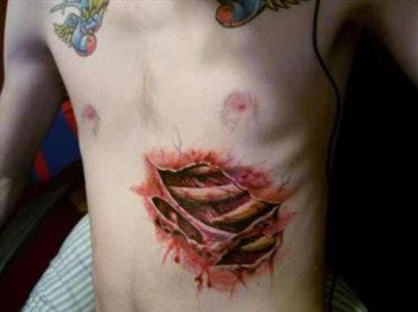 Ouch. Why? is listed (or ranked) 22 on the list Tattoos That Will Make You Super Uncomfortable Skin Tear Tattoo, Ripped Skin Tattoo, Zombie Tattoo, Anatomical Tattoos, Flesh Tattoo, Anatomy Tattoo, Tattoos On Side Ribs, Zombie Tattoos, Basic Tattoos