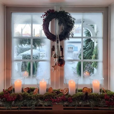 Anna-Lena Lindqvist on Instagram: "View from our kitchen on a frosty day last year (I have also sprayed fake snow on the window here to make It more frosty) I haven't started decorating for Christmas yet this year, there hasn't been time. We came home from Latvia on Sunday evening tired but happy after celebrating my husbands birthday with friends there. Our kids picked us up at the airport and surprised us with a new TV plugged in and ready with all the apps downloaded. Such a great 50th birt Holiday Candle In Window, Christmas View From Window, Fake Snow Spray Window Ideas, Fake Snow Decorations Window, Fake Snow Window Ideas Spray, Snow Spray Window Ideas Diy, Fake Snow Spray Ideas, Fake Snow On Windows, Snow On Windows Spray Ideas