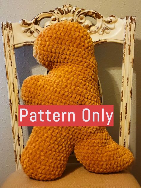 PATTERN ONLY Who doesn't love a good chicken nugget? Especially a GIANT DINOSAUR CHICKEN NUGGET! Super soft, super cuddly, this nuggie is here to be squished and loved. Finished product Measures about 1' 6" from bottom of foot to top of head. Purchase Policies: - The pattern and images in this document are the property of Amber Wilson aka Crocheters Corner  - This pattern is for personal use only. You may not redistribute, sell, or claim this pattern in whole, or in part, as your own. - If a pat Dinosaur Chicken Nugget Pillow, Chicken Nugget Amigurumi, Dinosaur Chicken Nugget Crochet, Crochet Dinosaur Pillow, Dinosaur Chicken Nugget Crochet Pattern Free, Dino Chicken Nugget Crochet Pattern Free, Crochet Dino Nugget Pattern, Dino Nugget Crochet Pattern, Crochet Big Plushies